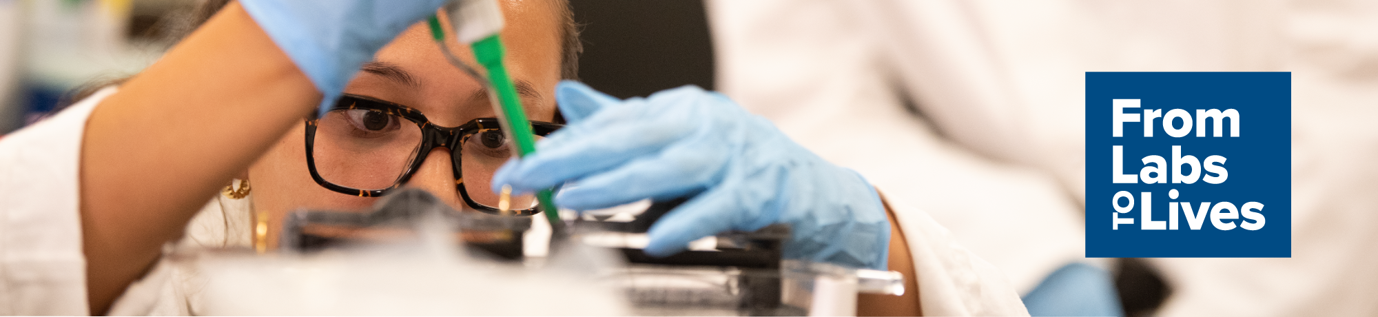 Banner image with from labs to lives logo and a researcher in a lab
