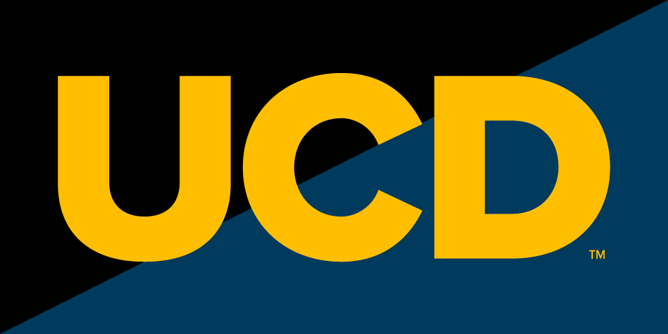 UCD mark in gold on dark
