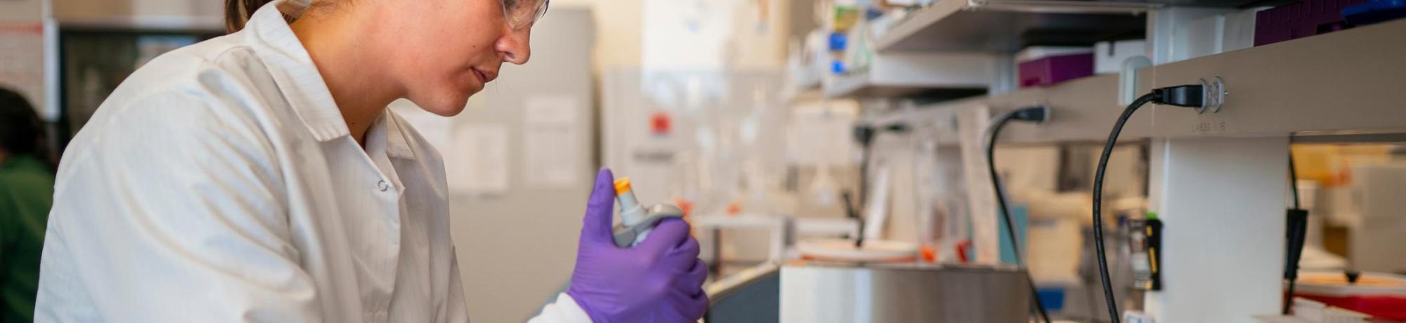 researcher uses lab equipment at UC Davis
